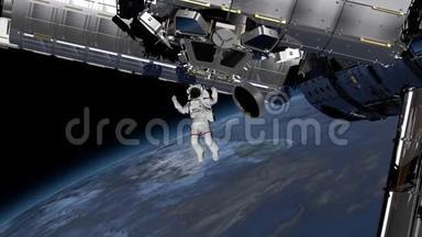 宇航员太空行走，在开阔的空间里挥动他的手。 国际空间站国际空间站围绕地球大气层旋转。 要素